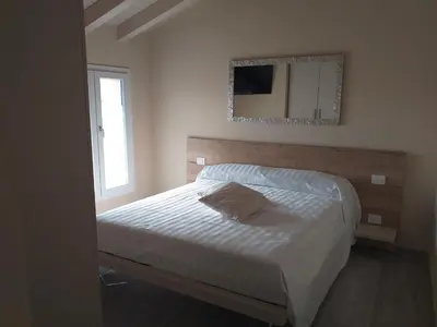 Letto o letti in una camera di Locanda la torre
