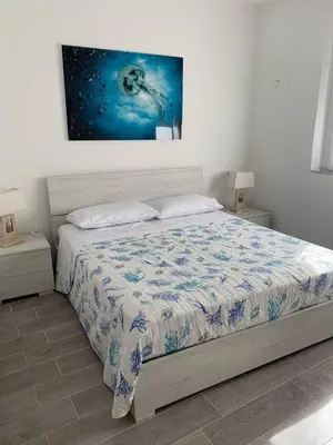 Letto o letti in una camera di Affittacamere Vallesanta