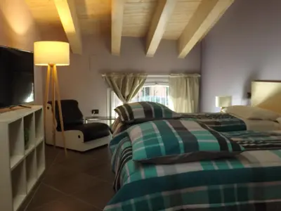 Letto o letti in una camera di AL TORRIONE