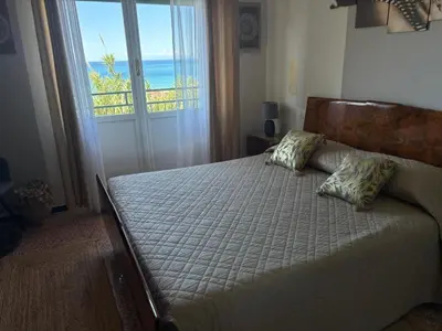 Letto o letti in una camera di Casa Perla