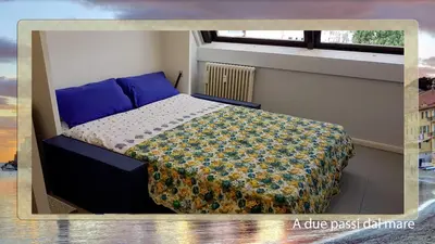 Letto o letti in una camera di A due passi dal mare