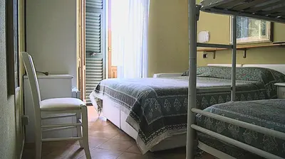 Letto o letti in una camera di affittacamere la loggia