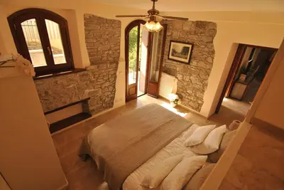Letto o letti in una camera di B&B Casale delle farfalle