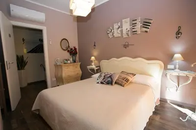 Letto o letti in una camera di Segui le note della Tua vita
