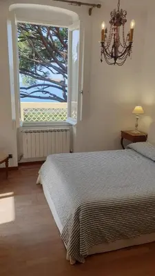 Letto o letti in una camera di VILLA MARE BLU
