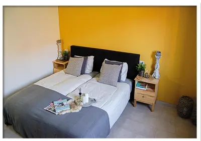 Letto o letti in una camera di Casa Valtaro