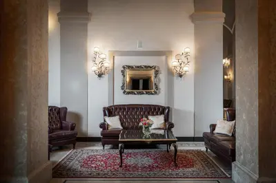 Area soggiorno di Grand Hotel di Parma | UNA Esperienze
