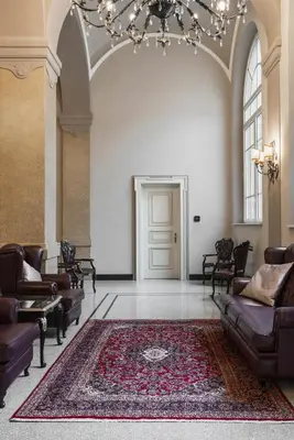 Area soggiorno di Grand Hotel di Parma | UNA Esperienze