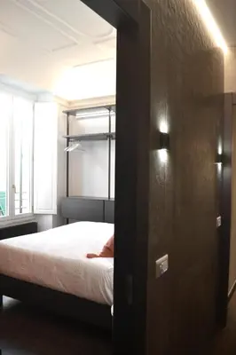 Letto o letti in una camera di PALAZZO DELLE SIRENE Deluxe Apartment & Boutique Rooms