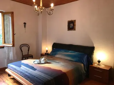 Letto o letti in una camera di S.Stefano d’Aveto: relax in montagna