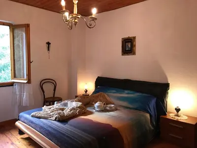 Letto o letti in una camera di S.Stefano d’Aveto: relax in montagna
