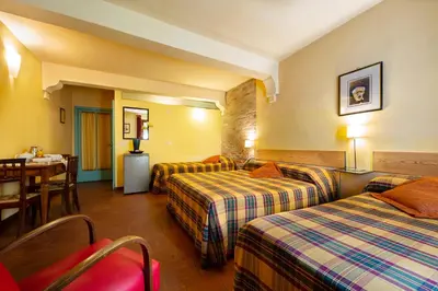 Letto o letti in una camera di B&B AL DUCALE and APARTMENTS