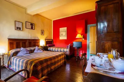 Letto o letti in una camera di B&B AL DUCALE and APARTMENTS