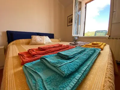 Letto o letti in una camera di La casa nei carobi