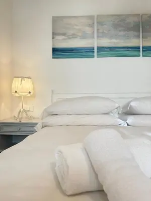 Letto o letti in una camera di La Terrazza sul Mare
