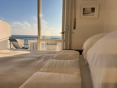 Letto o letti in una camera di La Terrazza sul Mare