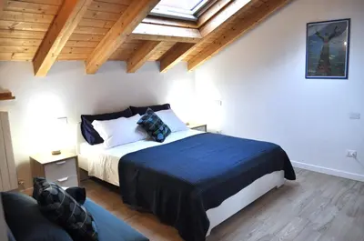 Letto o letti in una camera di La Torretta Boutique Accommodation