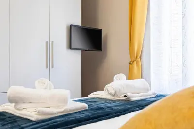 Letto o letti in una camera di casapalestro8#2