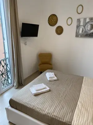 Letto o letti in una camera di Maestrale Charme Rooms