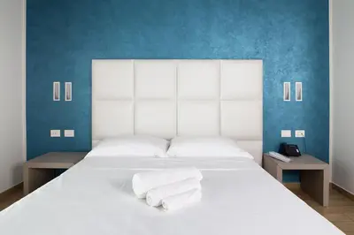 Letto o letti in una camera di Hotel Al Veliero