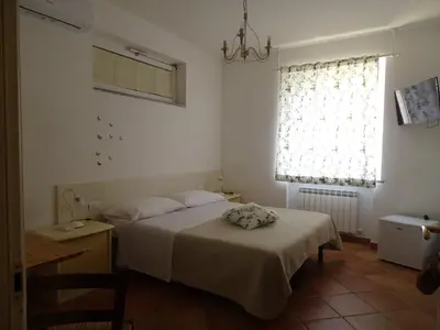 Letto o letti in una camera di Archi Di Sole