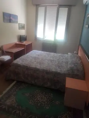 Letto o letti in una camera di Albergo Fonda