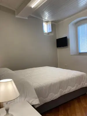 Letto o letti in una camera di la suite di via Mazzini