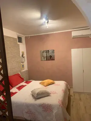 Letto o letti in una camera di Casa Elisabetta