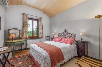 Letto o letti in una camera di Agriturismo Frecciarossa