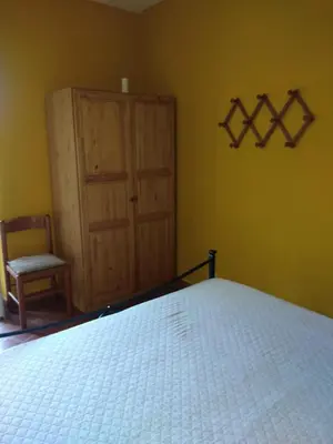 Letto o letti in una camera di Appartamento il Giglio