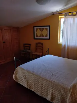 Letto o letti in una camera di Appartamento Rosa