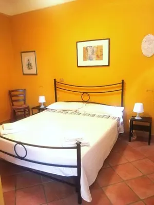 Letto o letti in una camera di Appartamento Ortensia