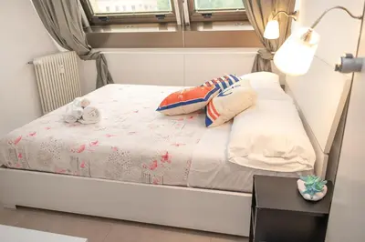 Letto o letti in una camera di 069 - Casa TRAMONTO, in CENTRO, 450metri da Mare Spiaggia