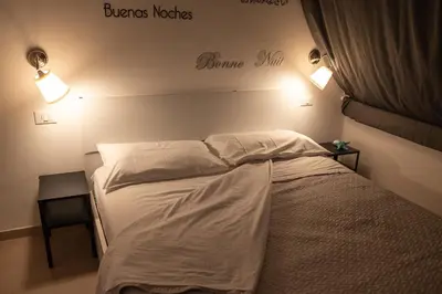 Letto o letti in una camera di 068 - Casa STELLA MARINA in CENTRO, 450metri da Mare e Spiaggia