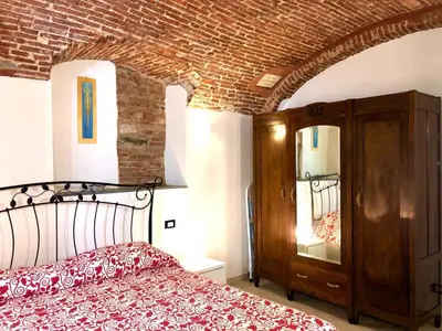 Letto o letti in una camera di San Rocco apartment