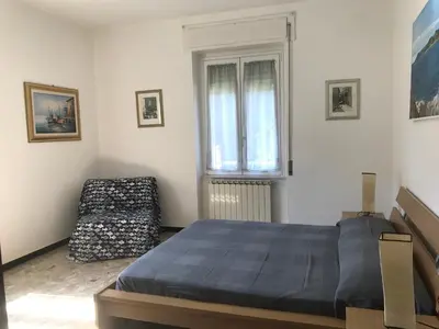 Letto o letti in una camera di HOST IN LEVANTO - Scirocco con biciclette