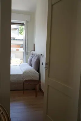 Letto o letti in una camera di La Rotonda 2 Camere con terrazza in centro