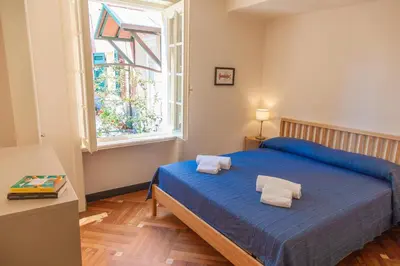 Letto o letti in una camera di PORTOVECCHIO