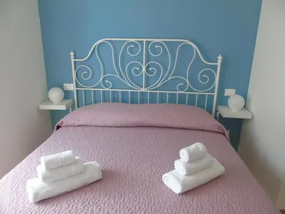 Letto o letti in una camera di Affittacamere SveMilla