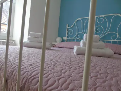 Letto o letti in una camera di Affittacamere SveMilla