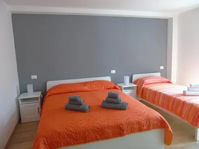 Letto o letti in una camera di Affittacamere SveMilla