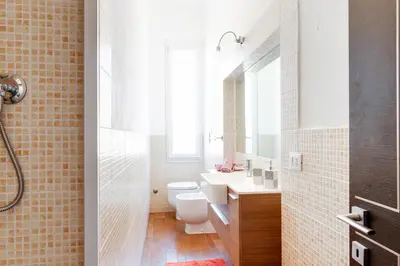 Bagno di GuestHost - Migliarina Cozy Apartment