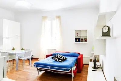 Area soggiorno di GuestHost - Migliarina Cozy Apartment