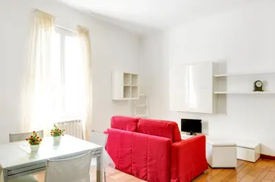Area soggiorno di GuestHost - Migliarina Cozy Apartment