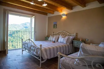 Letto o letti in una camera di La Beppa - Casa Vacanza