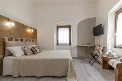 Letto o letti in una camera di A Casa Di Gaia