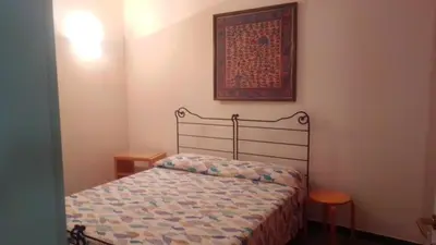 Letto o letti in una camera di DA ROSETTINA