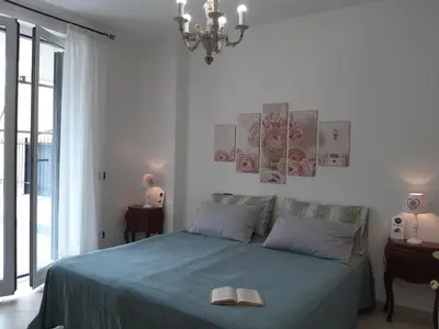 Letto o letti in una camera di Casa Terra e Mare by Holiday World