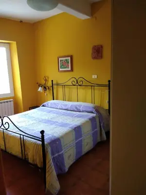 Letto o letti in una camera di Appartamento Oleandro