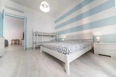 Letto o letti in una camera di Gli appartamenti della Fra